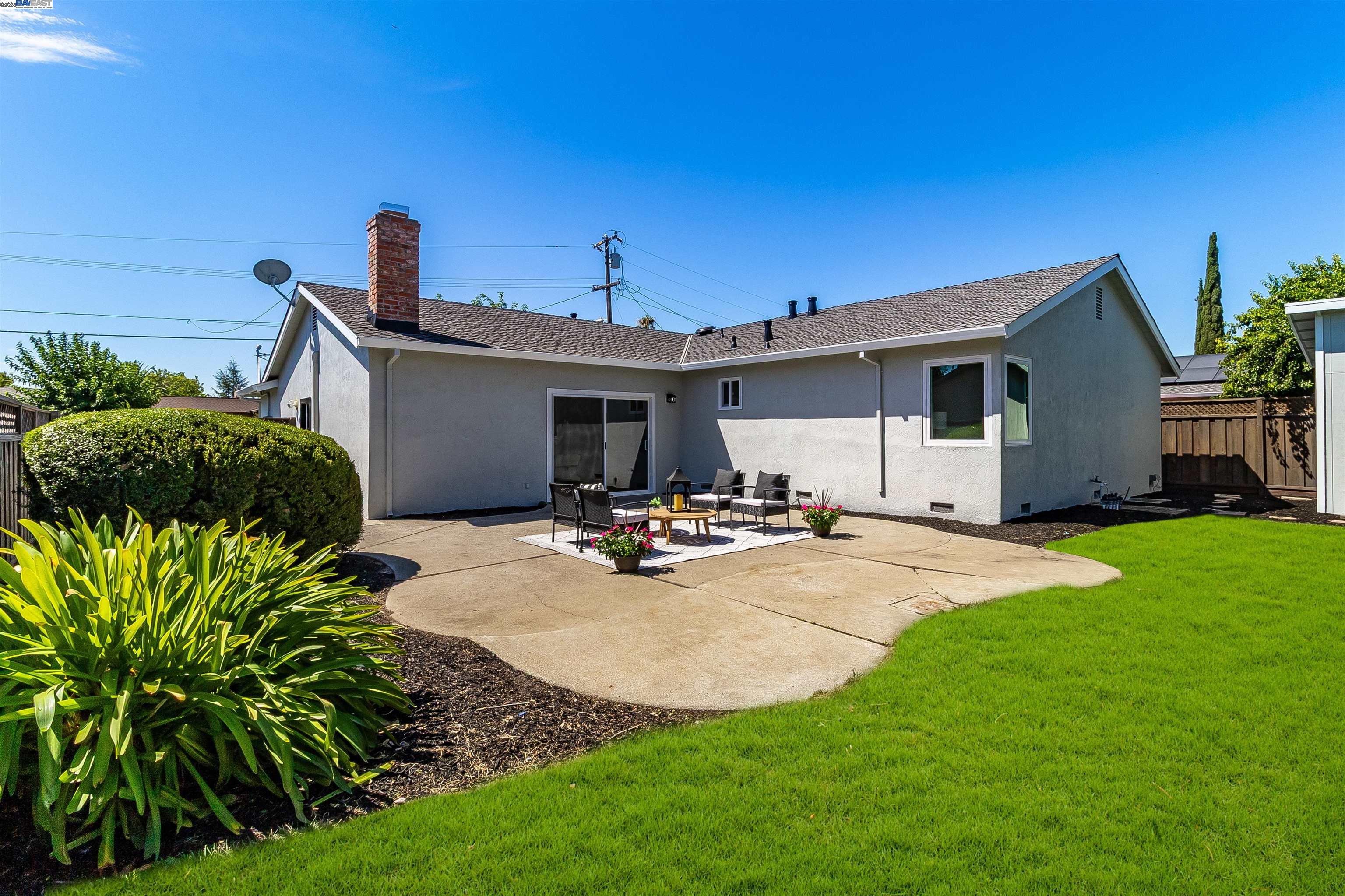 736 Adams Avenue Livermore, CA 94550 - Photo 41 of 52 a view of a house with backyard and sitting area