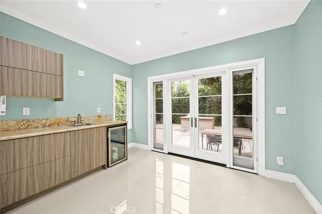 a view of a kitchen with a sink