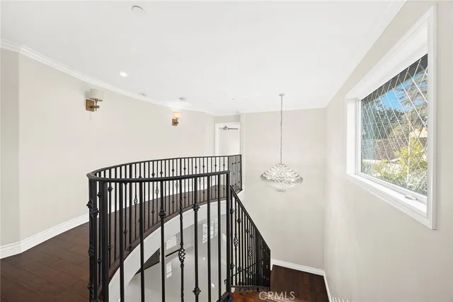 a view of a hallway with windows