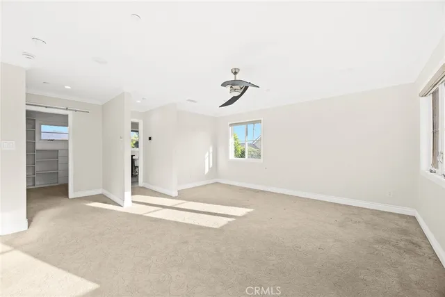 an empty room with windows