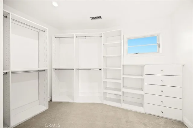 a view of a house with backyard and porch