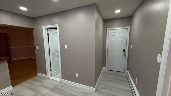 wooden floor in an empty room with an empty room