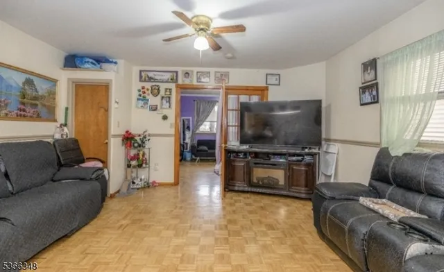 a kitchen with stainless steel appliances a stove a sink and a refrigerator