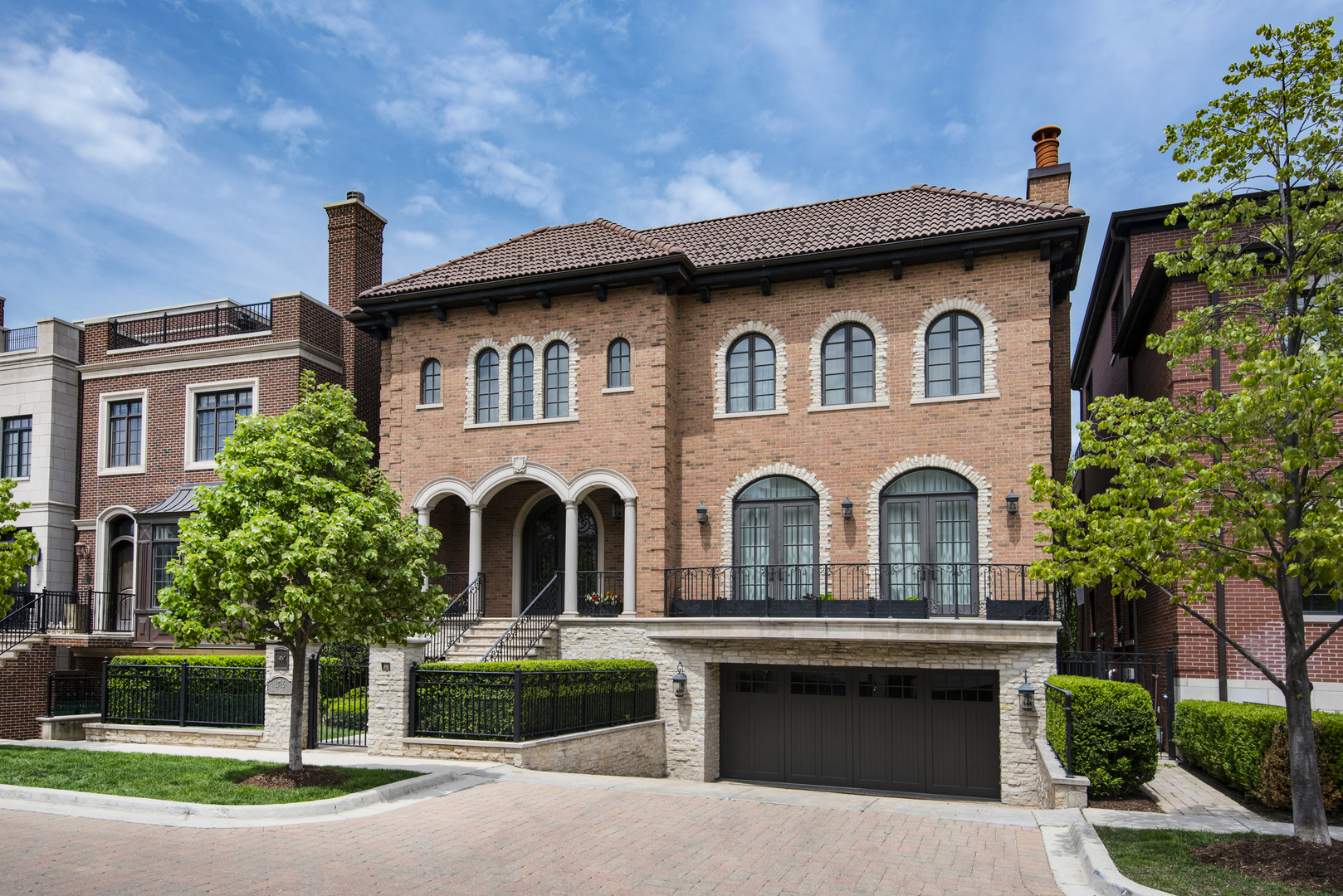 1746 West Surf Street Chicago, IL 60657 - Photo 2 of 37 a front view of a house with a garden