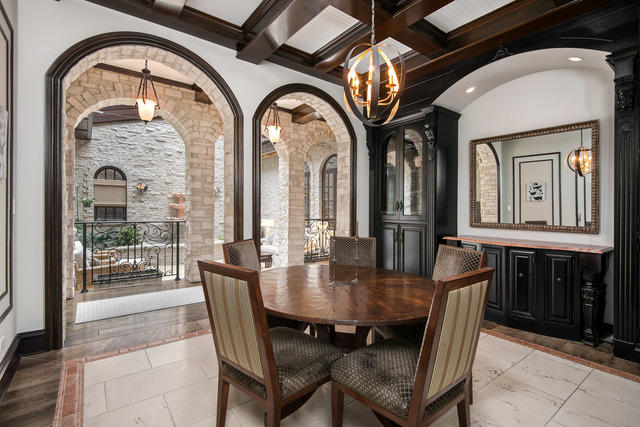 1746 West Surf Street Chicago, IL 60657 - Photo 12 of 37 a dining room with furniture a chandelier and wooden floor