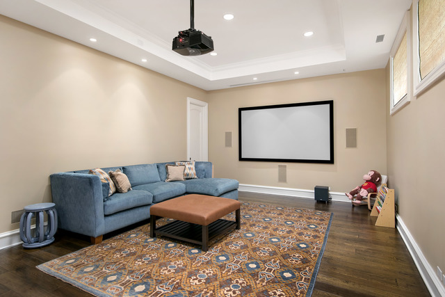 1746 West Surf Street Chicago, IL 60657 - Photo 32 of 37 a living room with furniture and a flat screen tv