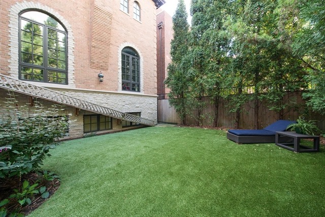 1746 West Surf Street Chicago, IL 60657 - Photo 5 of 37 a front view of a house with garden