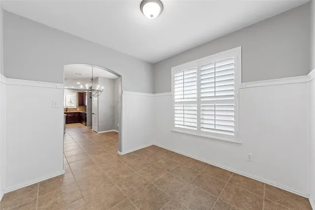 a view of livingroom and a window in a room