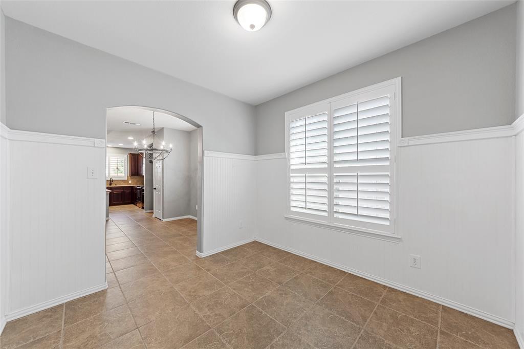 1901 Fair Parke Lane Wylie, TX 75098 - Photo 17 of 37 a view of livingroom and a window in a room