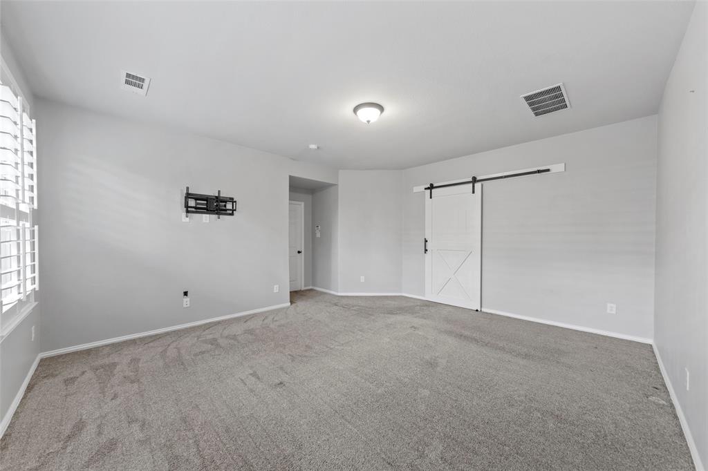 1901 Fair Parke Lane Wylie, TX 75098 - Photo 20 of 37 a view of an empty room with a window