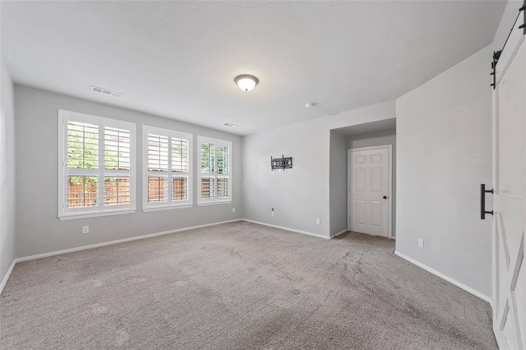 1901 Fair Parke Lane Wylie, TX 75098 - Photo 21 of 37 a view of an empty room with a window