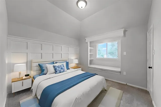 a bedroom with a bed and window