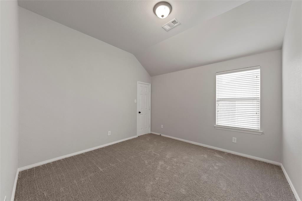 1901 Fair Parke Lane Wylie, TX 75098 - Photo 31 of 37 an empty room with a window