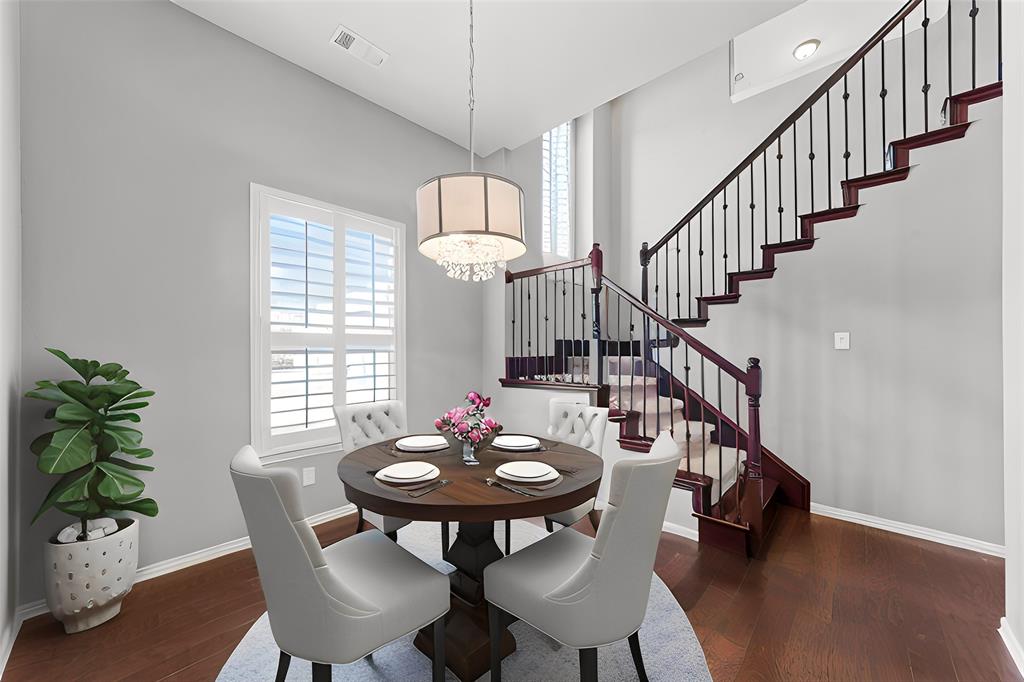 1901 Fair Parke Lane Wylie, TX 75098 - Photo 4 of 37 a view of a dining room with furniture window and wooden floor