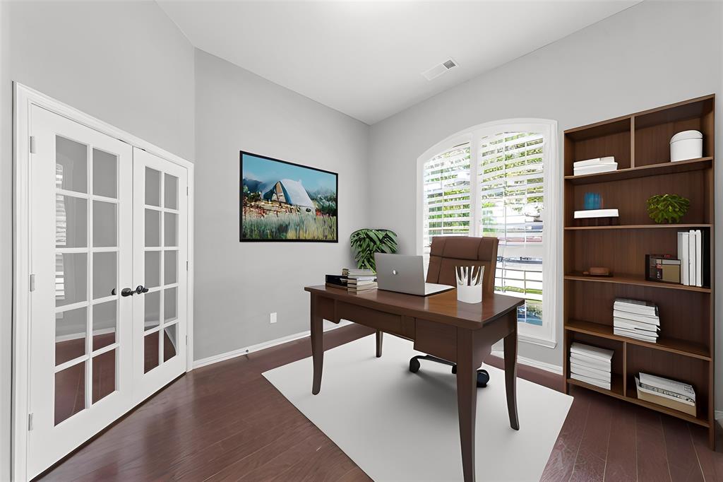 1901 Fair Parke Lane Wylie, TX 75098 - Photo 5 of 37 a view of a workspace with furniture and a bookshelf