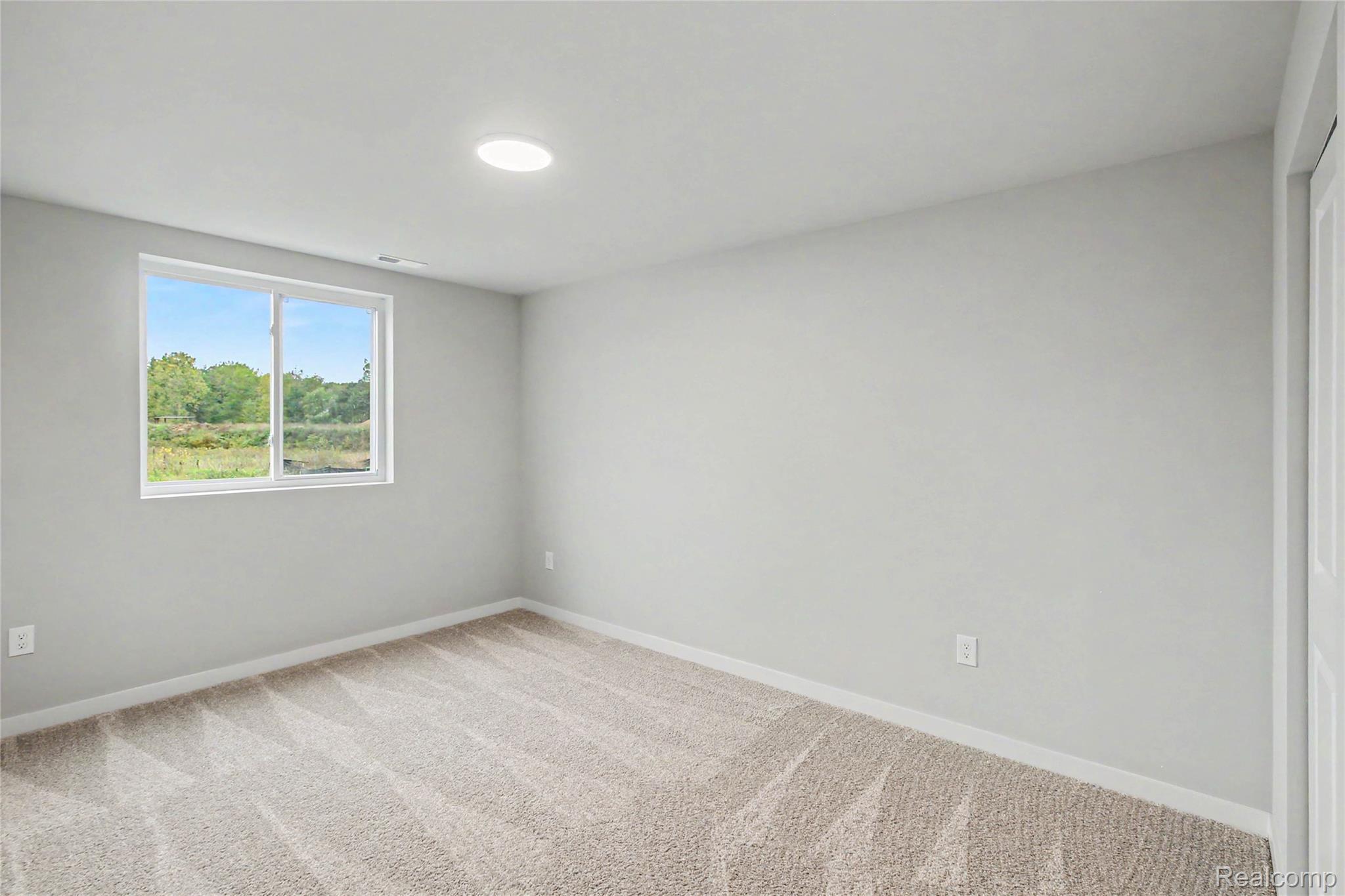 1210 Lockes Street Howell, MI 48843 - Photo 18 of 37 Lower level bedroom 4