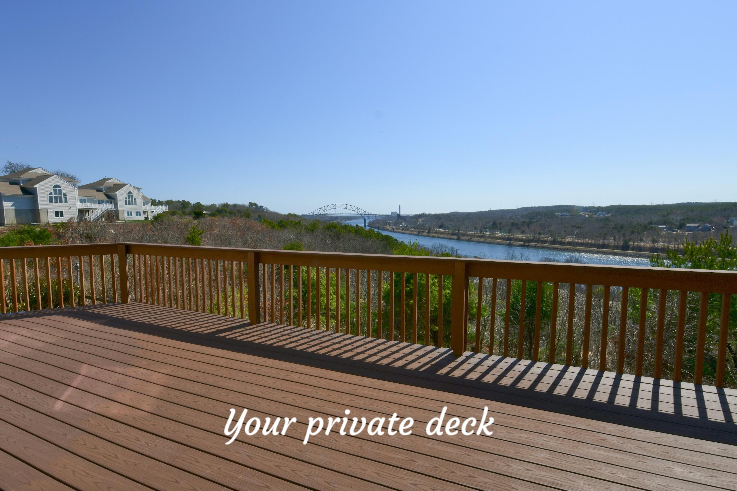 4 Bittersweet Lane, Unit 4G Buzzards Bay, MA 02532 - Photo 16 of 26 a balcony with wooden floor