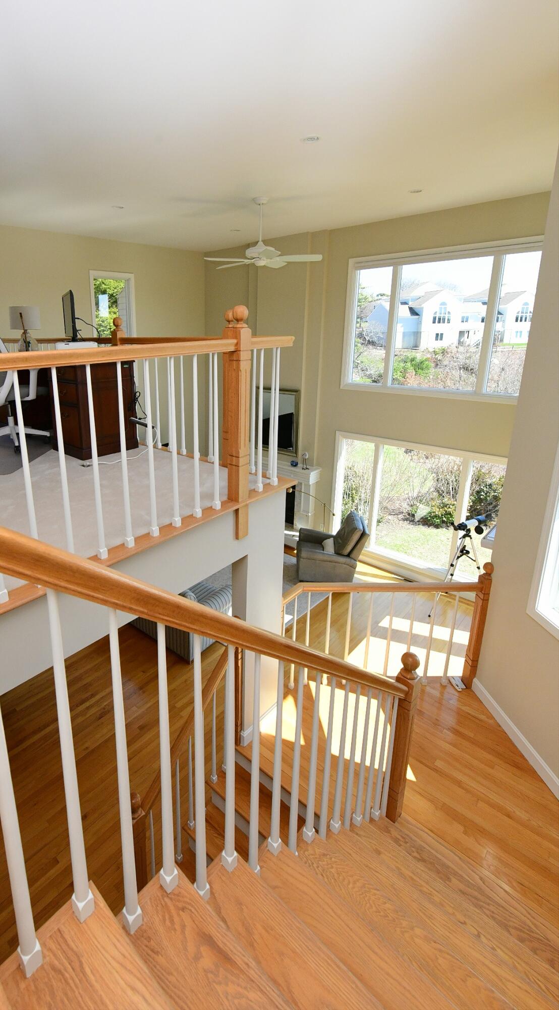 4 Bittersweet Lane, Unit 4G Buzzards Bay, MA 02532 - Photo 19 of 26 a view of balcony with wooden floor and seating space