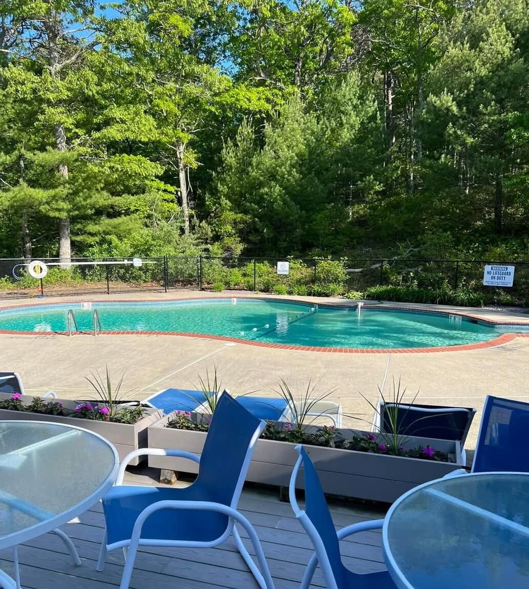 4 Bittersweet Lane, Unit 4G Buzzards Bay, MA 02532 - Photo 26 of 26 a view of outdoor space yard swimming pool and outdoor seating