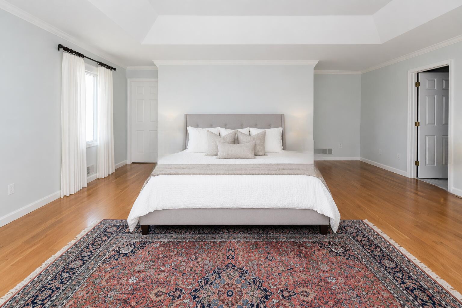 4 Bittersweet Lane, Unit 4G Buzzards Bay, MA 02532 - Photo 7 of 26 a large bed sitting in a spacious bedroom next to a window