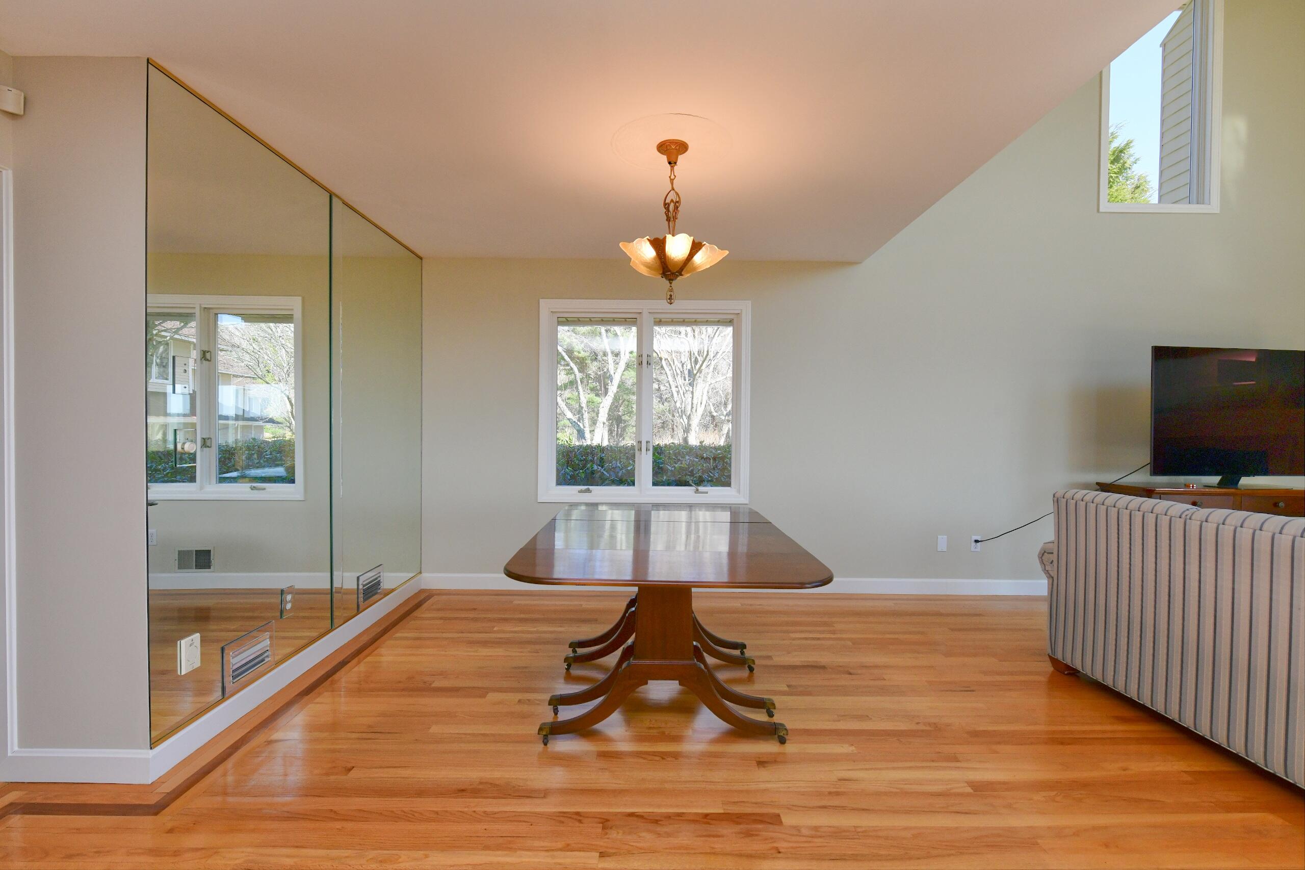 4 Bittersweet Lane, Unit 4G Buzzards Bay, MA 02532 - Photo 10 of 26 a spacious bedroom with a bed and a window