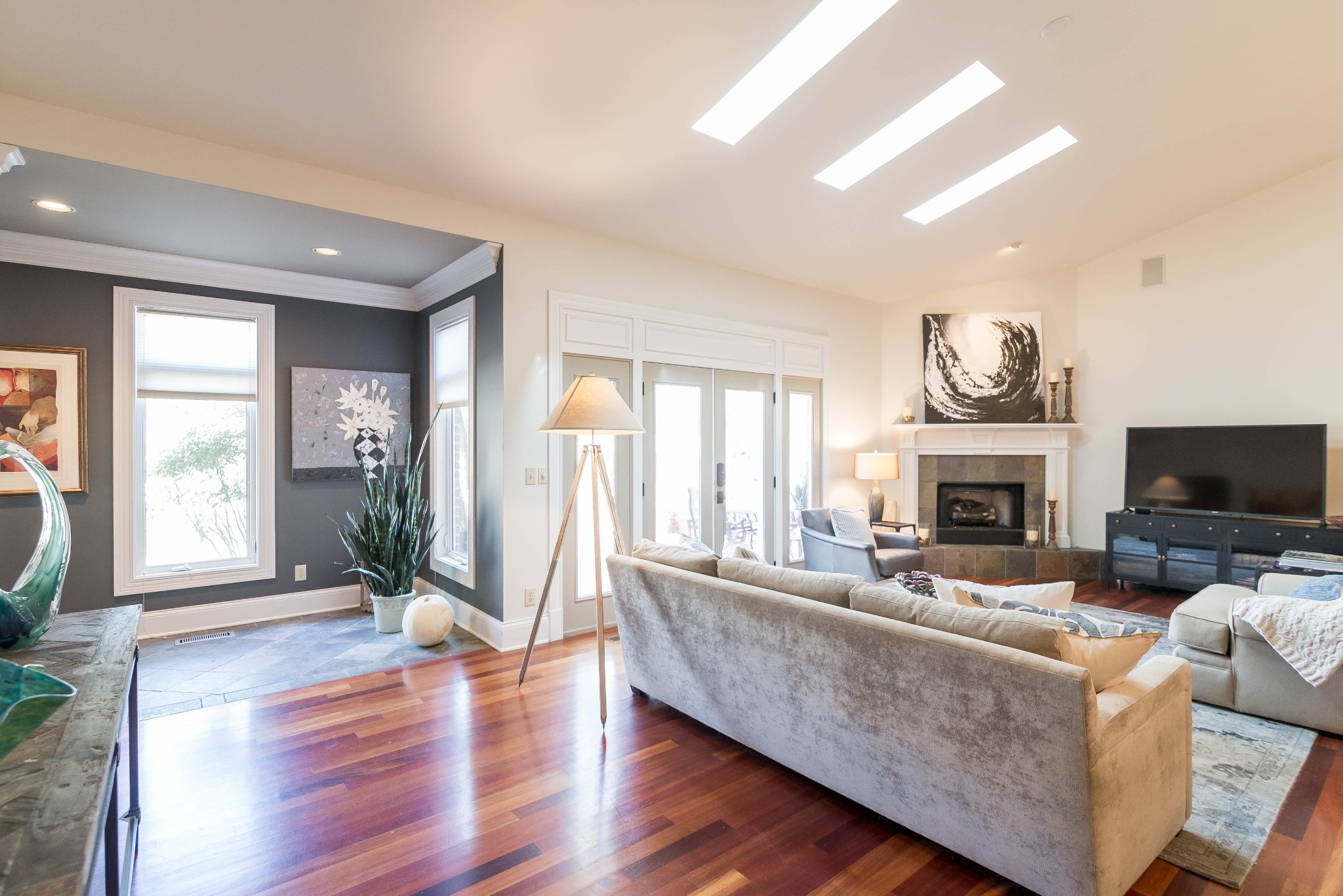 4122 Sneed Road Nashville, TN 37215 - Photo 1 of 16 a living room with furniture a fireplace and a flat screen tv