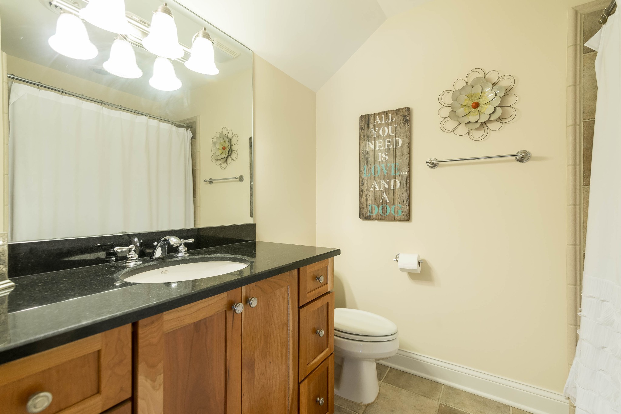 4122 Sneed Road Nashville, TN 37215 - Photo 14 of 16 a bathroom with a granite countertop sink mirror vanity and toilet
