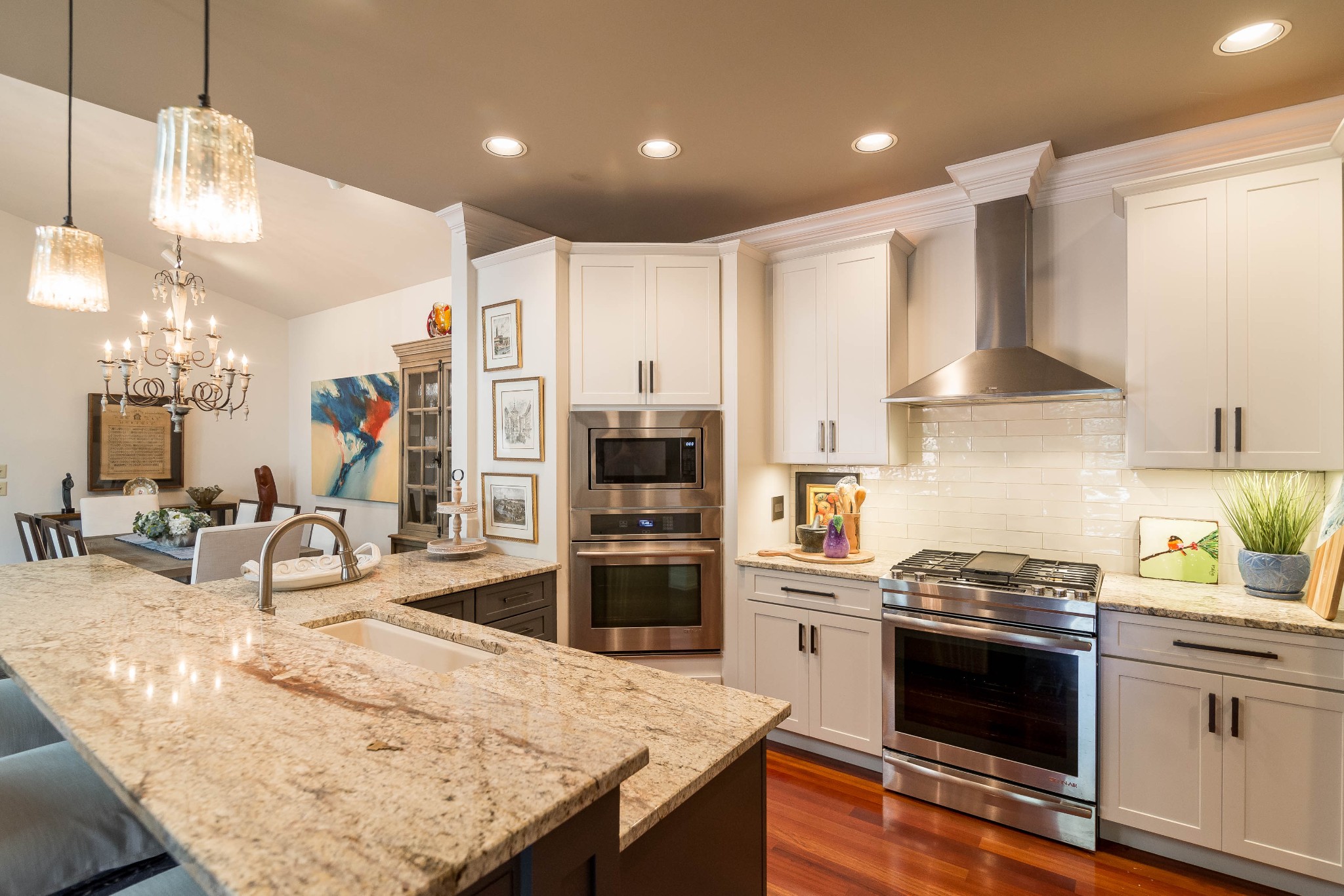 4122 Sneed Road Nashville, TN 37215 - Photo 4 of 16 a kitchen with stainless steel appliances granite countertop a sink stove and refrigerator