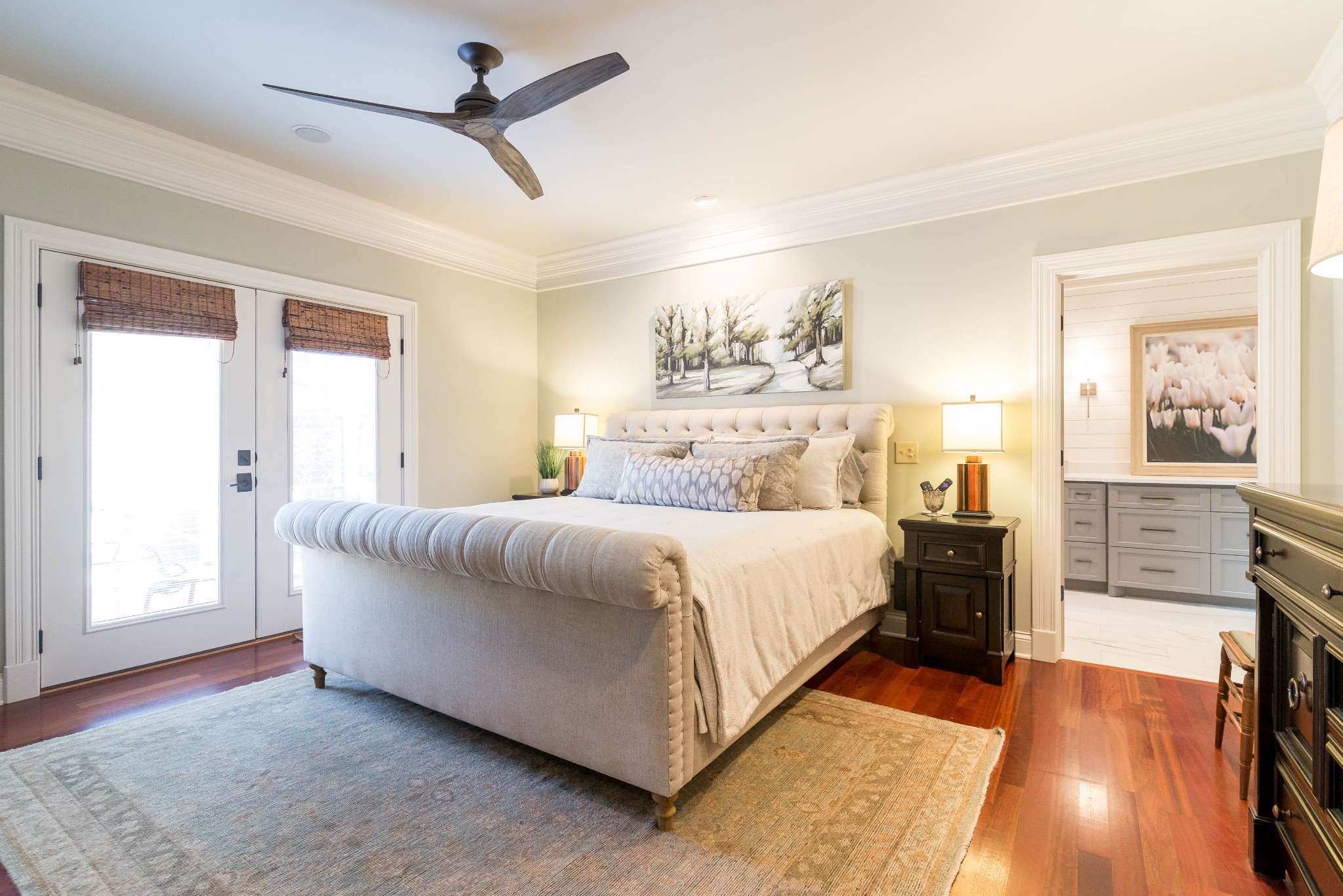 4122 Sneed Road Nashville, TN 37215 - Photo 7 of 16 a bedroom with a bed and dresser with wooden floor