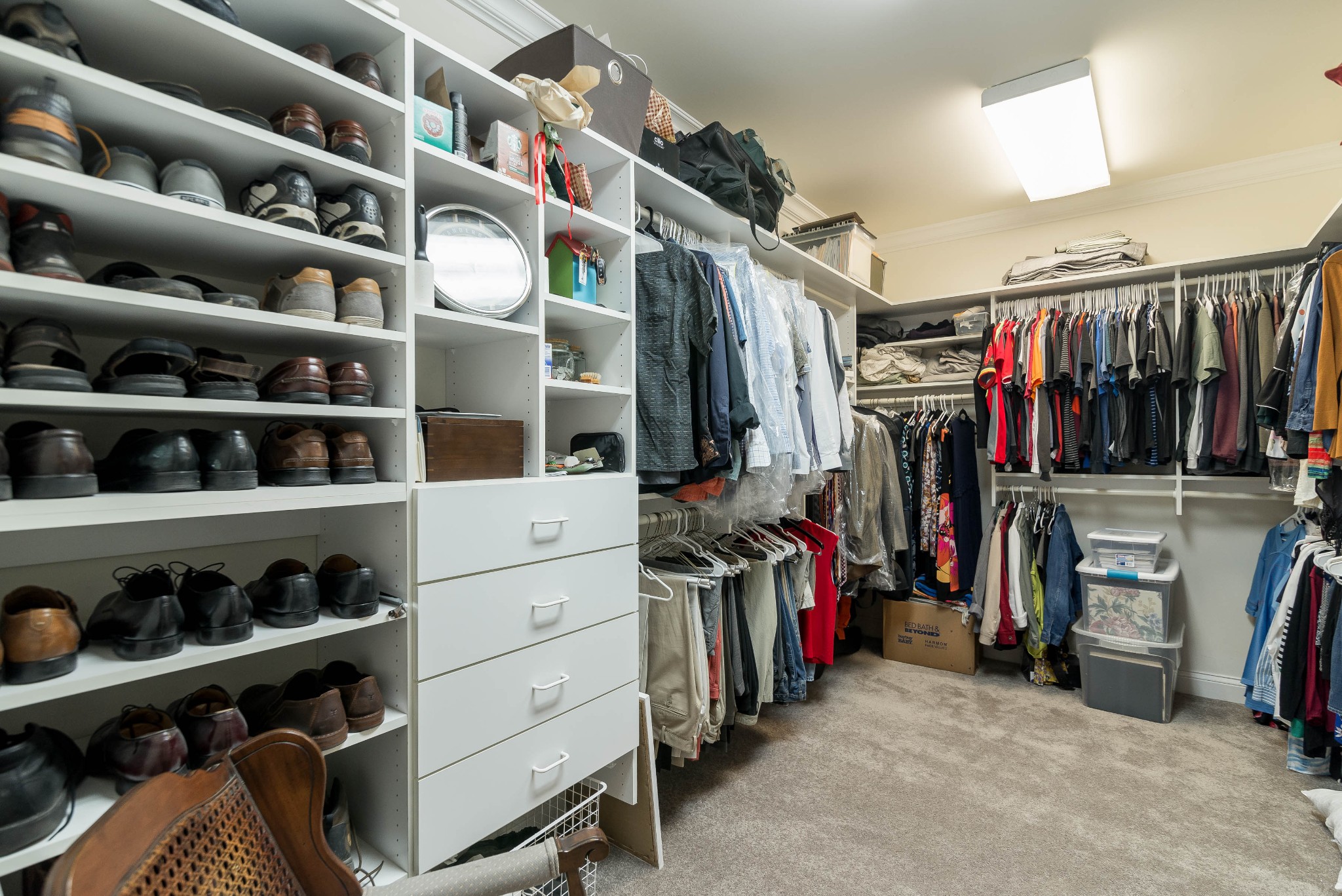 4122 Sneed Road Nashville, TN 37215 - Photo 9 of 16 a view of walk in closet with clothes and shoes