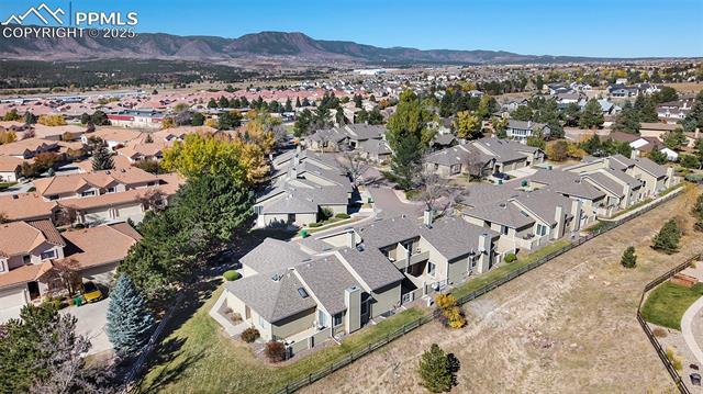 86 Rising Sun Terrace Colorado Springs, CO 80921 - Photo 30 of 36 View of property location with mountains and nearby suburban area