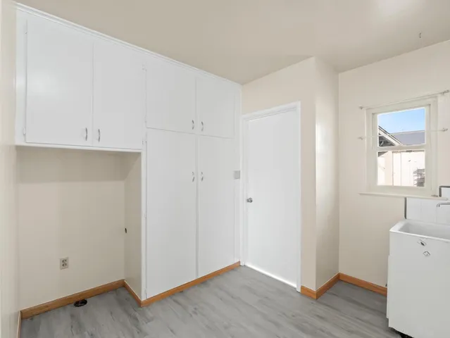 a view of house with outdoor space and sitting area