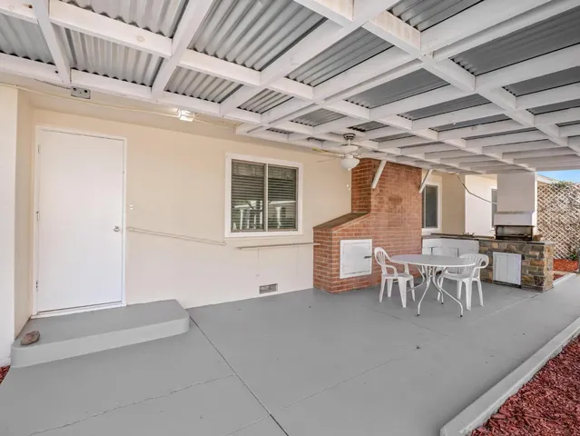 a view of a yard with trees