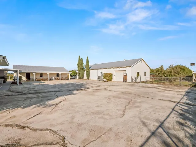 a view of a room with window and wooden floor