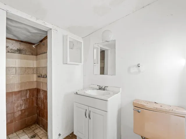 a view of a balcony with wooden floor