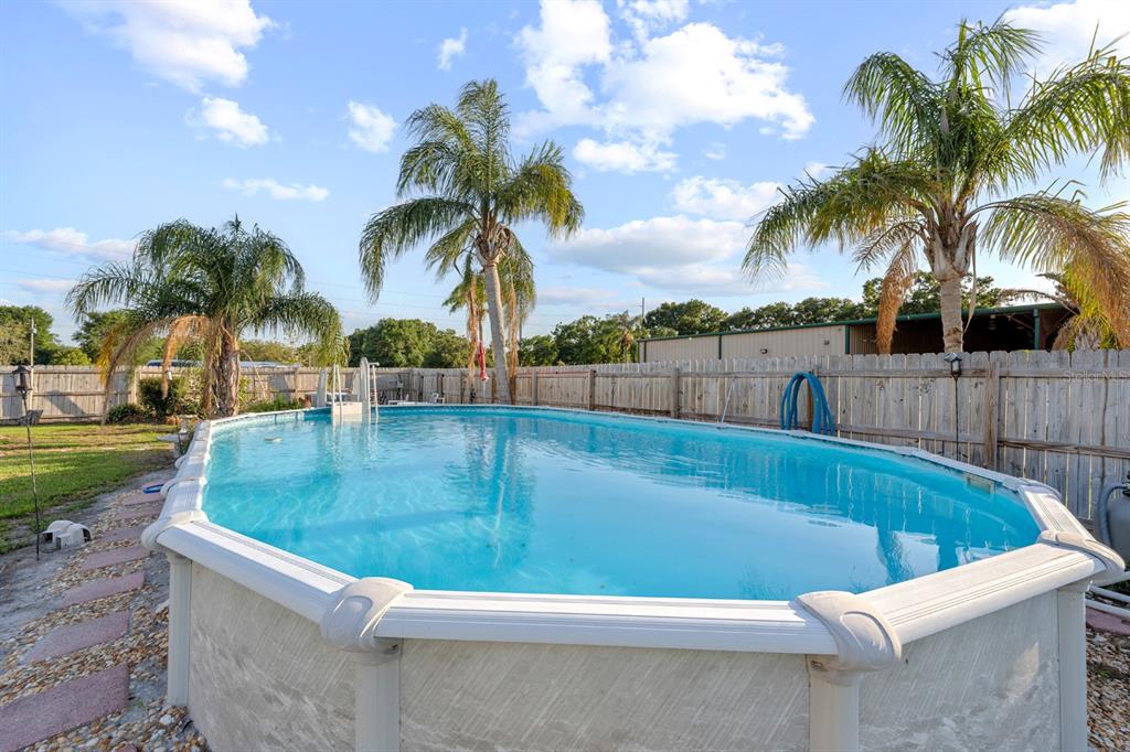 7705 Gardner Road Tampa, FL 33625 - Photo 15 of 51 a view of outdoor space and swimming pool