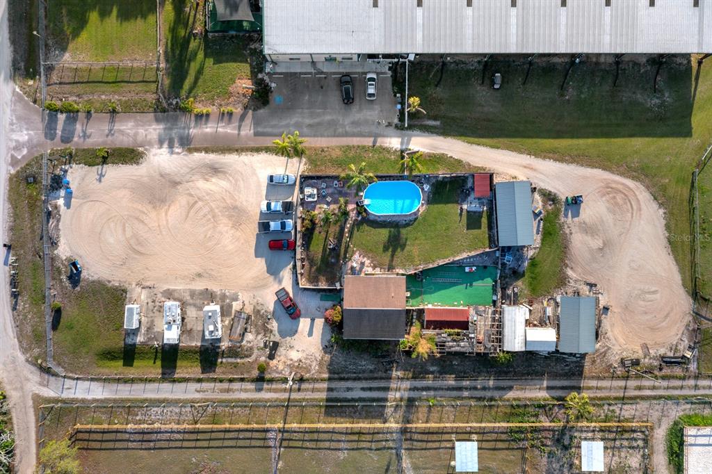 7705 Gardner Road Tampa, FL 33625 - Photo 18 of 51 an aerial view of a house with swimming pool