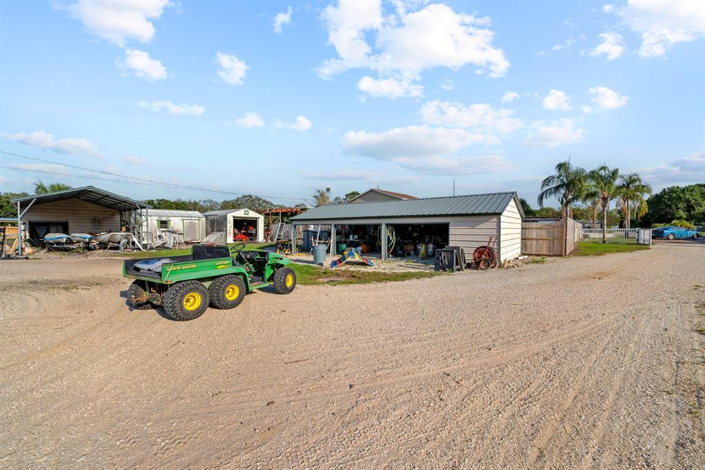 7705 Gardner Road Tampa, FL 33625 - Photo 20 of 51 a view of a street with cars
