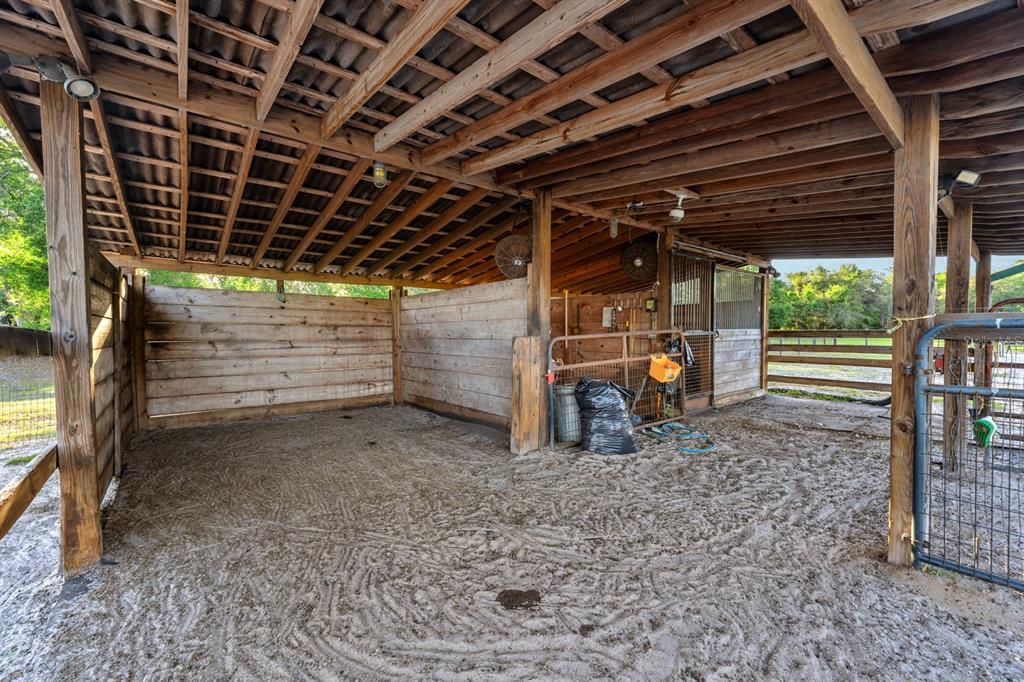 7705 Gardner Road Tampa, FL 33625 - Photo 23 of 51 a view of empty room with wooden ceiling