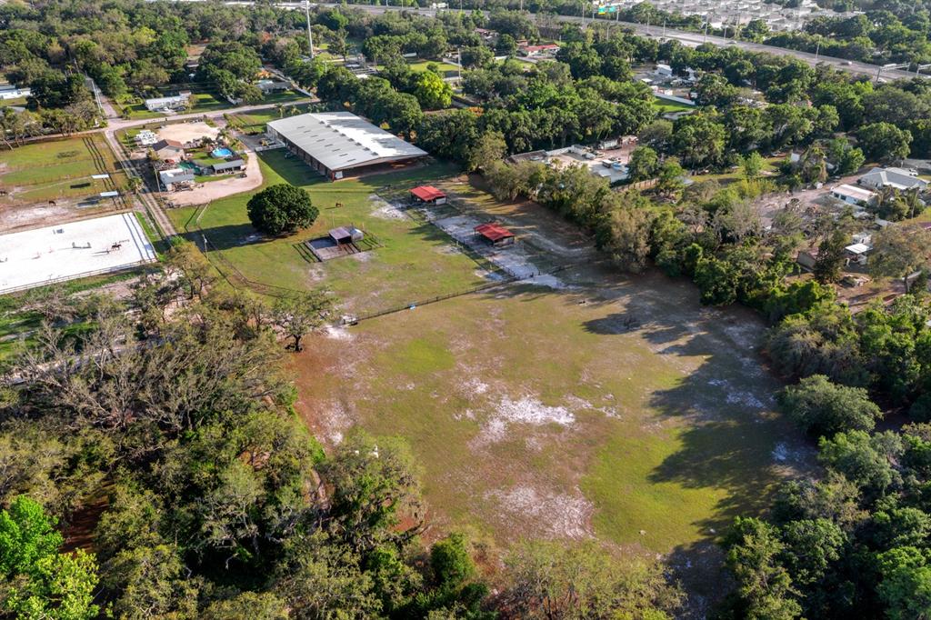 7705 Gardner Road Tampa, FL 33625 - Photo 51 of 51 an aerial view of a houses with yard