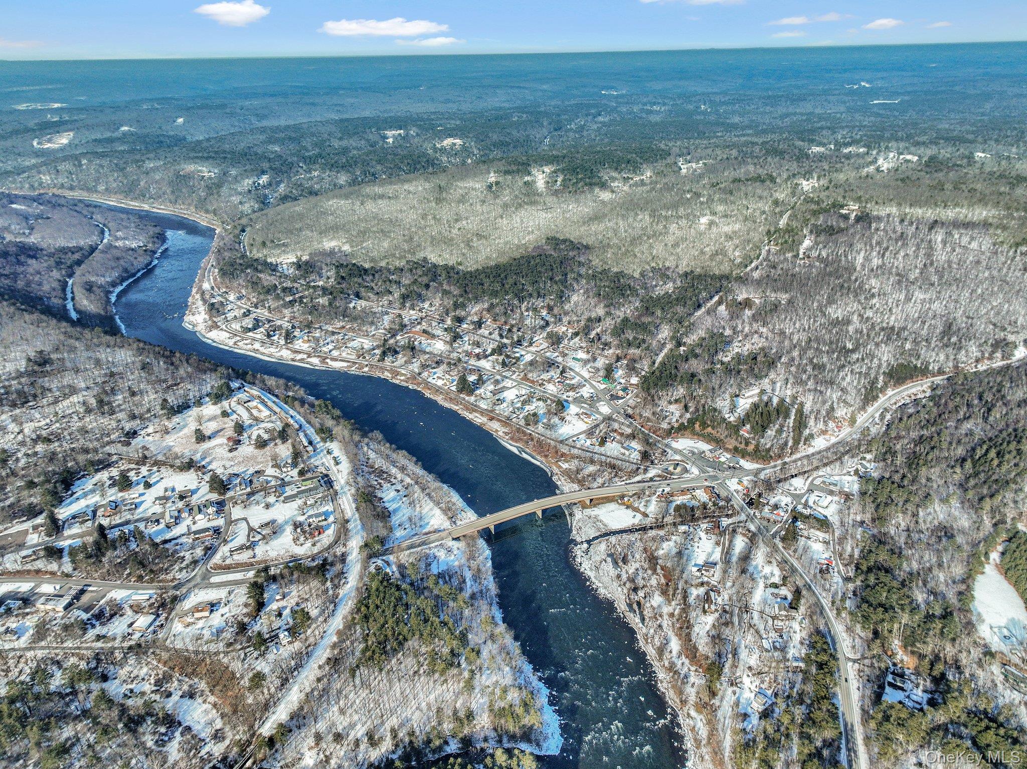Lot 11.1 State Route 55 And Mail Road Barryville, NY 12719 - Photo 2 of 5 a view of a lake with a mountain