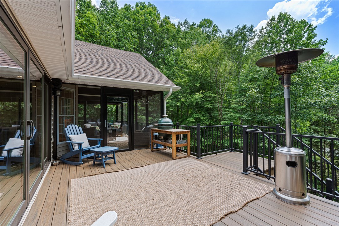 322 Shorecrest Drive Seneca, SC 29672 - Photo 23 of 30 An inviting deck offers a perfect spot for relaxation and entertaining amidst lush natural surroundings.