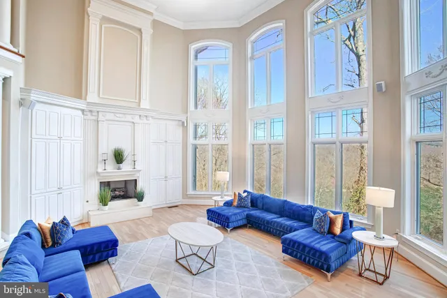 a bedroom with a bed and a mirror on the dresser