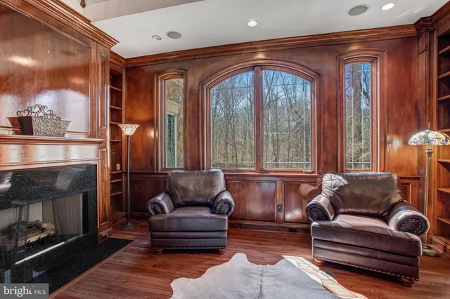 a view of balcony with wooden floor and fence