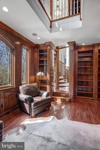 a view of a dinning table and chairs on the deck