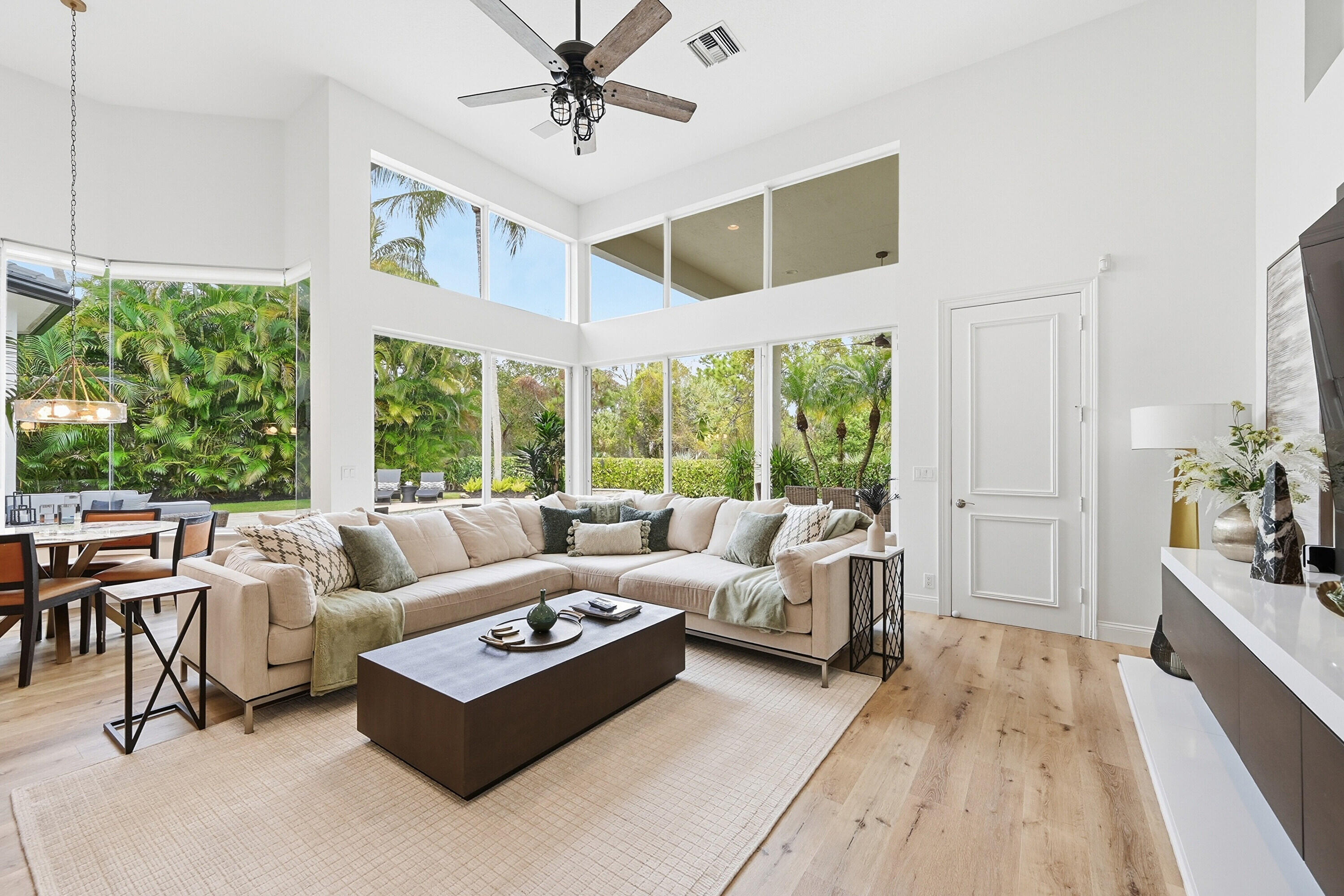 2399 Northwest 49th Lane Boca Raton, FL 33431 - Photo 25 of 75 a living room with furniture and a large window