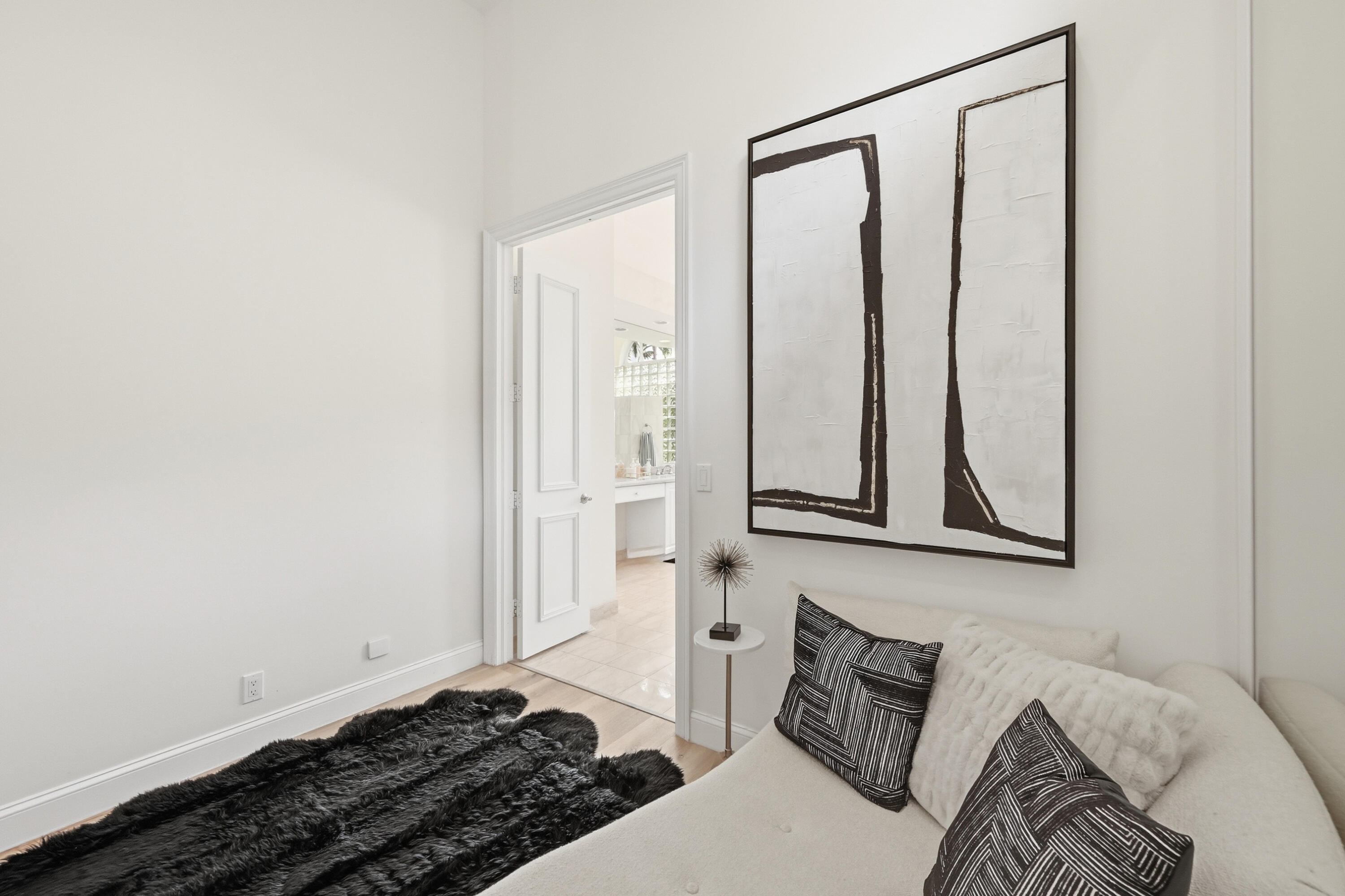 2399 Northwest 49th Lane Boca Raton, FL 33431 - Photo 32 of 75 a bedroom with a bed and a window