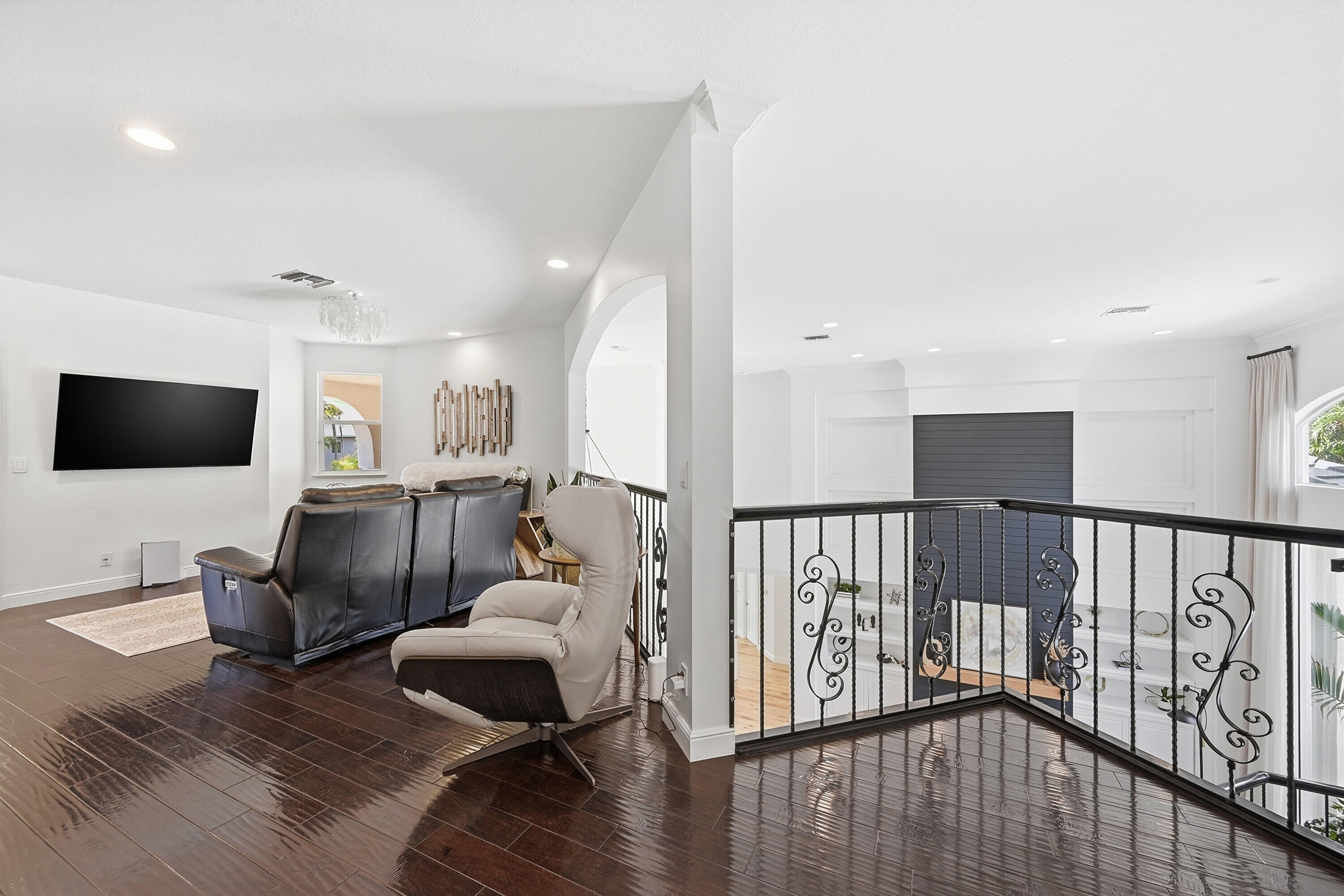 2399 Northwest 49th Lane Boca Raton, FL 33431 - Photo 46 of 75 a living room with furniture and a flat screen tv