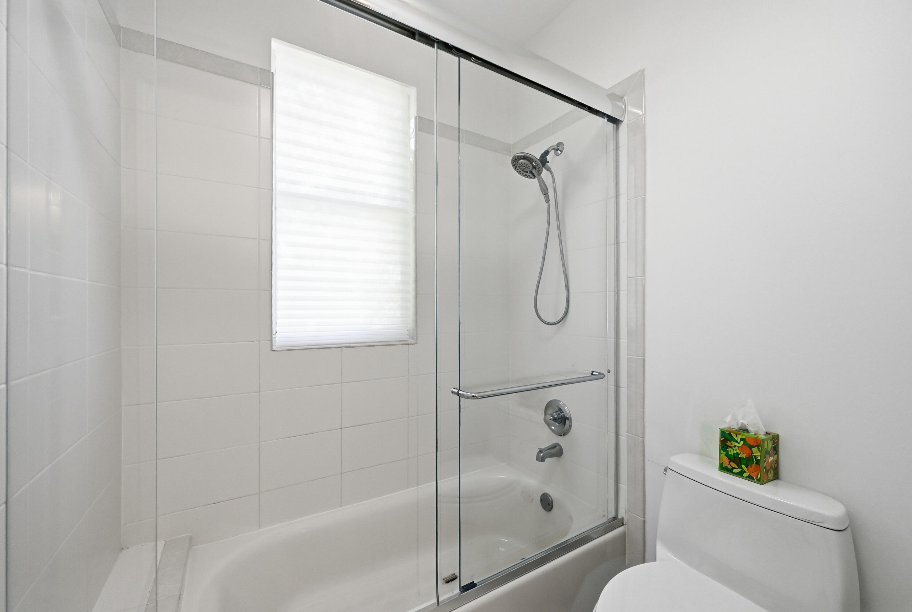 2399 Northwest 49th Lane Boca Raton, FL 33431 - Photo 50 of 75 a bathroom with a shower and a toilet