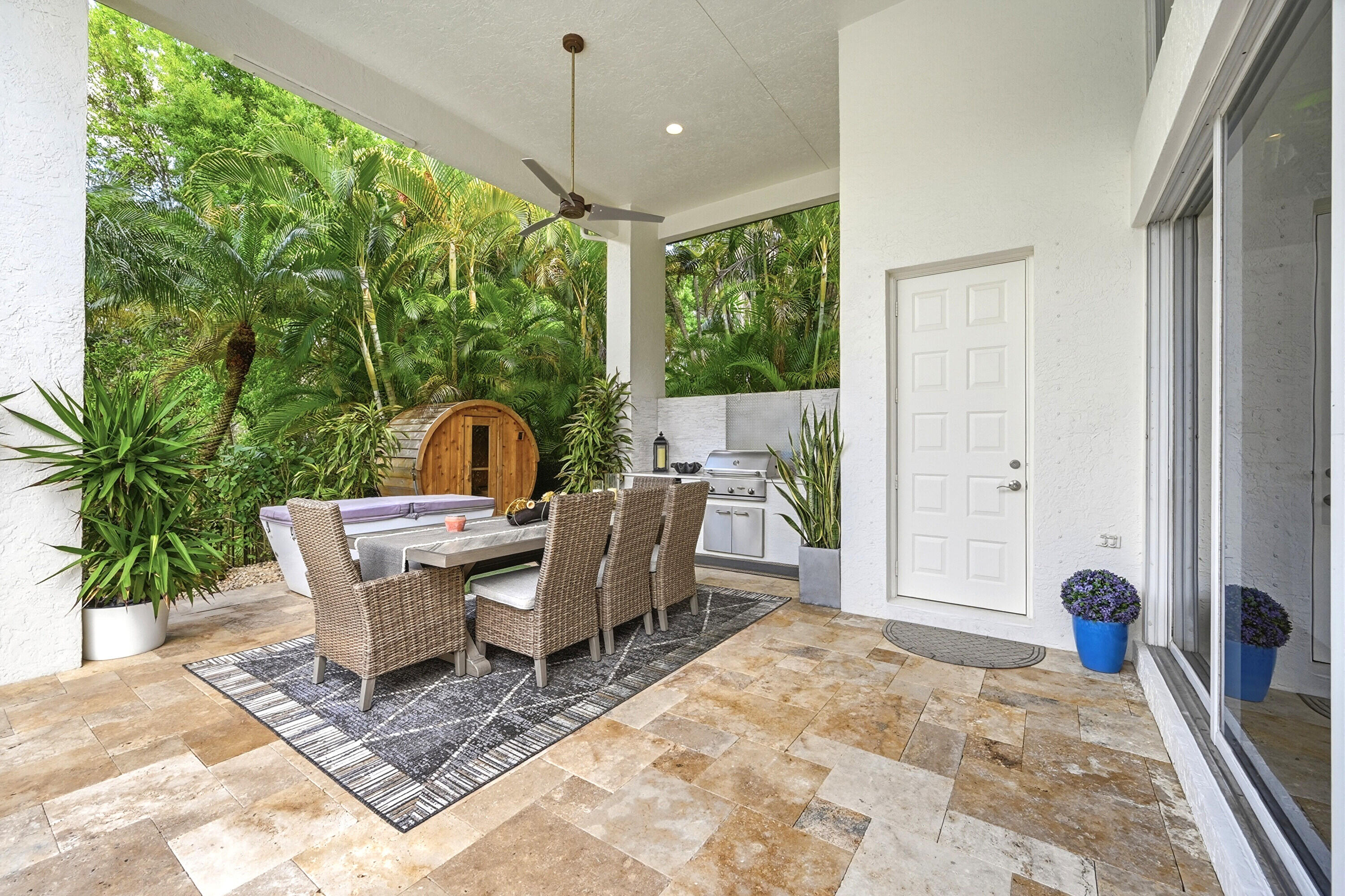 2399 Northwest 49th Lane Boca Raton, FL 33431 - Photo 59 of 75 a view of a dining room with furniture window and wooden floor